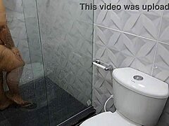 Mature lady with a big ass enjoys a shower
