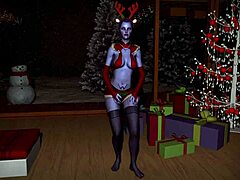 Viuda sensual baila sensualmente en el dormitorio en Navidad