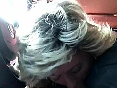 Mature blonde woman passionately giving oral sex while traveling